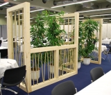 Wooden room devider with plants